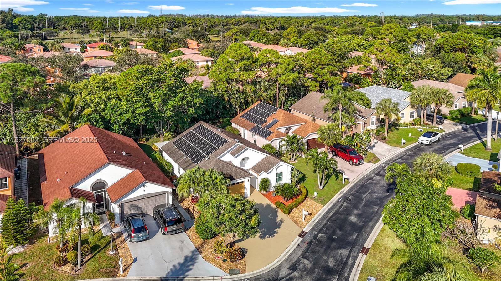 356 Hammocks Trail Greenacres, FL 33413 - Photo 37 of 41 an aerial view of residential houses with outdoor space and street view