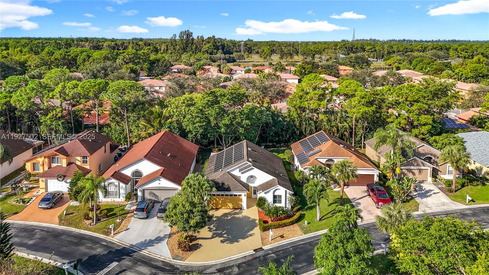 356 Hammocks Trail Greenacres, FL 33413 - Photo 38 of 41 an aerial view of residential houses with outdoor space and street view