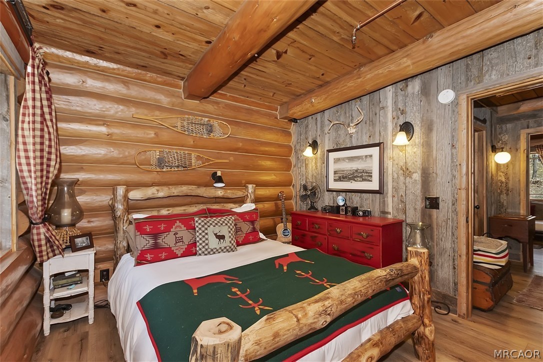 29632 Hook Creek Road Cedar Glen, CA 92321 - Photo 14 of 43 a bed room with a bed and a dresser