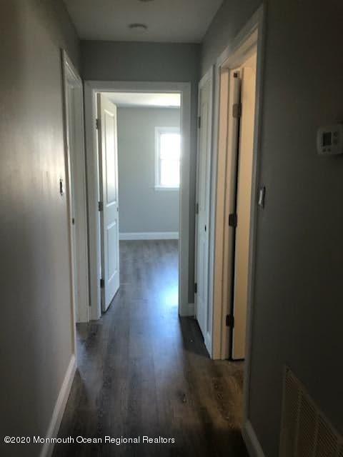 2 Higgins Court Brick, NJ 08724 - Photo 13 of 21 a view of a hallway with wooden floor