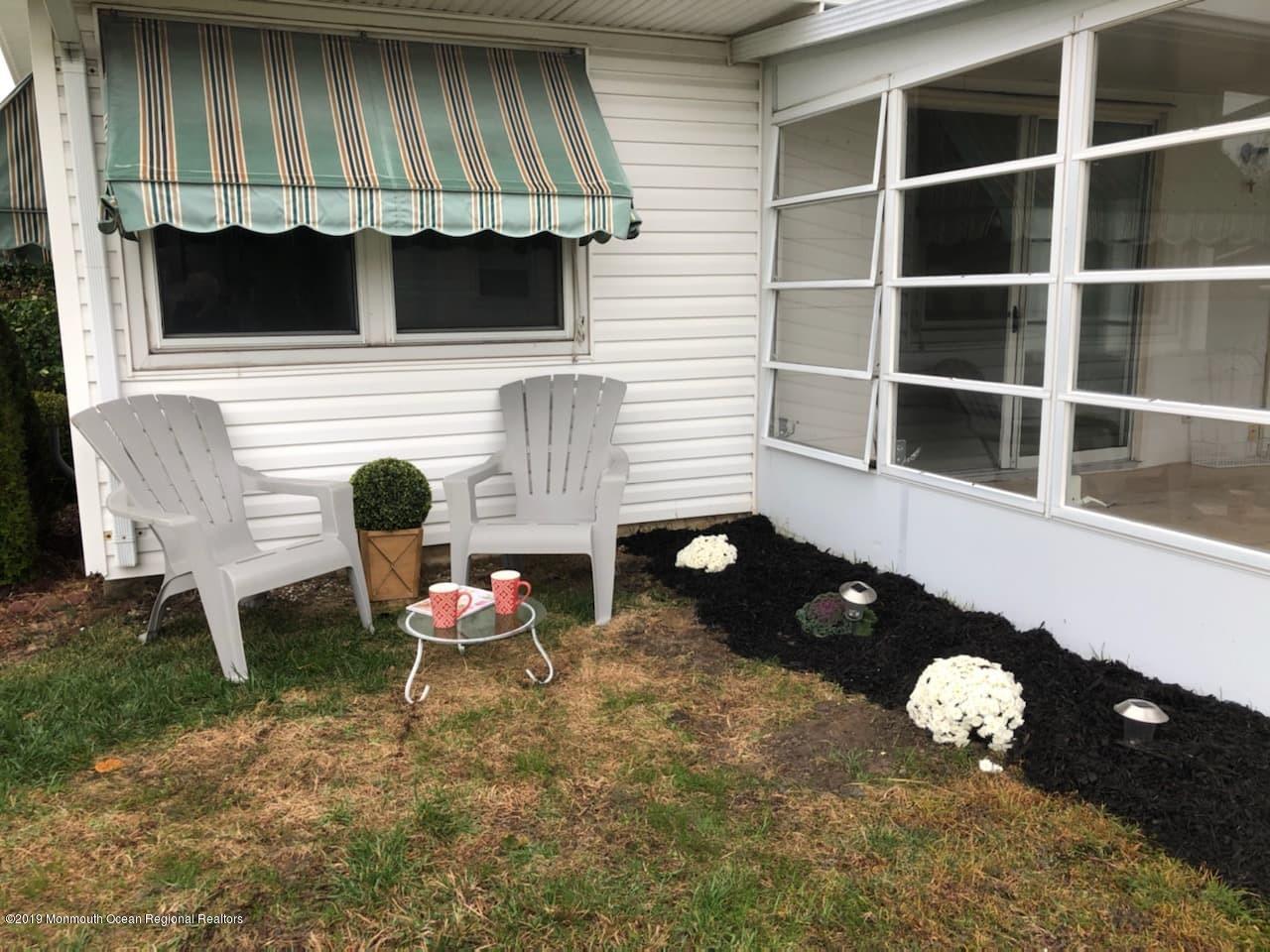 2 Higgins Court Brick, NJ 08724 - Photo 17 of 21 a room with a chair and a window