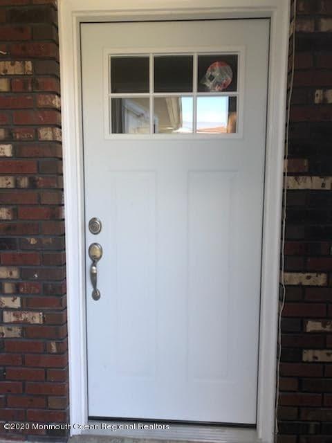 2 Higgins Court Brick, NJ 08724 - Photo 6 of 21 a window and a window