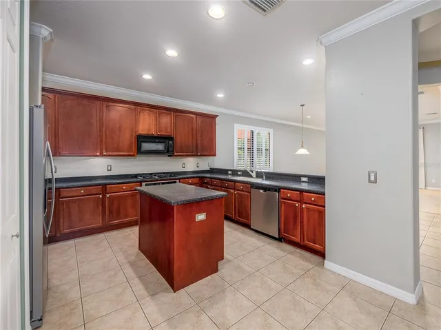 a bathroom with a bathtub and window