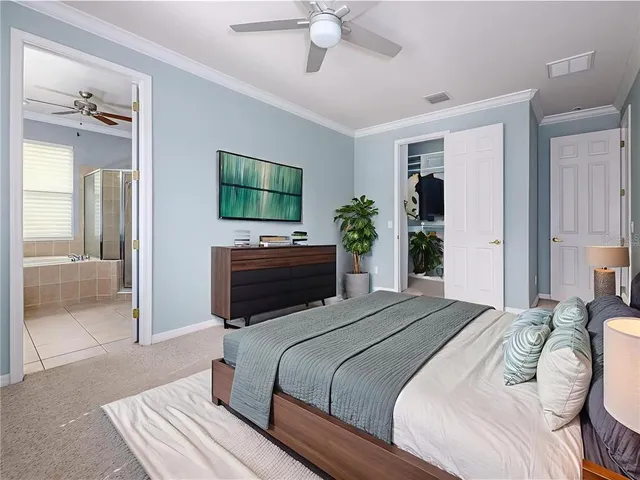 a bathroom with a granite countertop sink toilet a mirror and bathtub