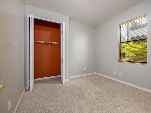 a view of a house with a yard and plants
