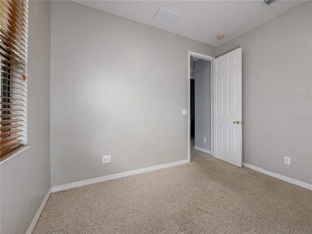 a view of a lake with a big yard