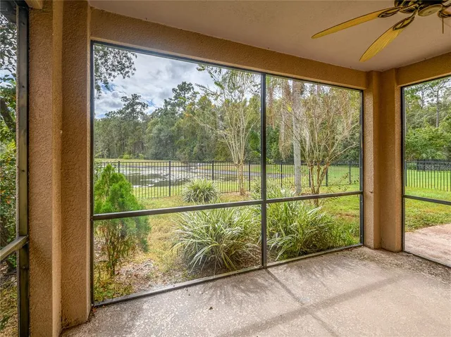 an aerial view of residential house with outdoor space and lake view
