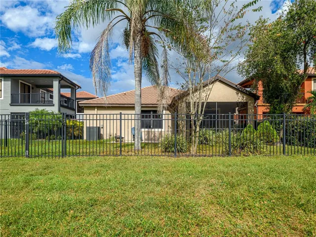 an aerial view of a house with a garden