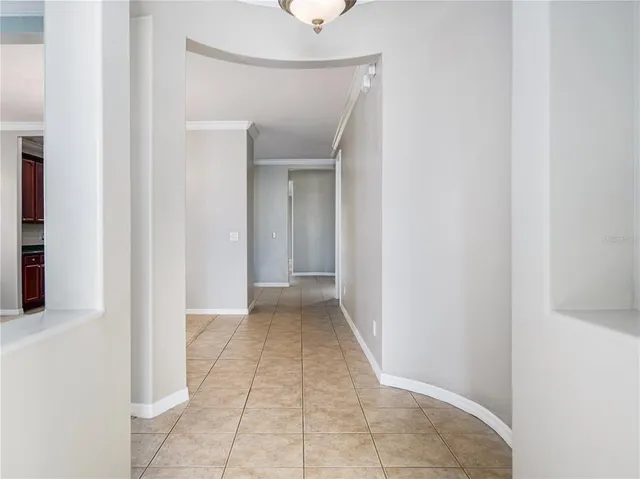 a large kitchen with stainless steel appliances granite countertop a stove sink and cabinets