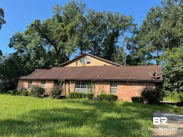 103 Briarcliff Road Brewton, AL 36426 - Photo 1 of 7 Ranch-style house with a front lawn