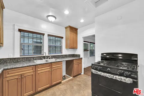 a view of a hallway with washer and dryer