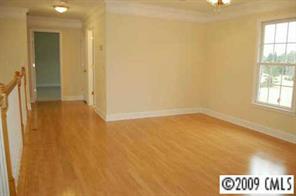 6250 Cress Road Concord, NC 28025 - Photo 7 of 8 an empty room with a window