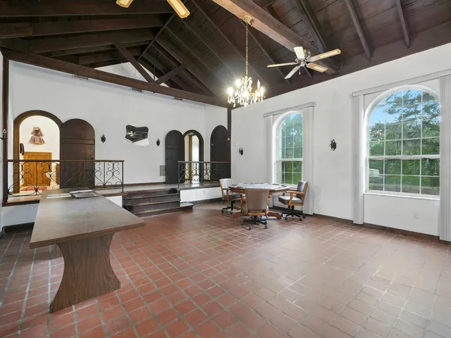 a lobby with furniture and window