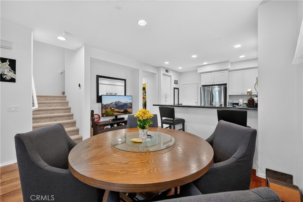 849 The Promenade, Unit D Azusa, CA 91702 - Photo 11 of 37 a view of a dining room with furniture