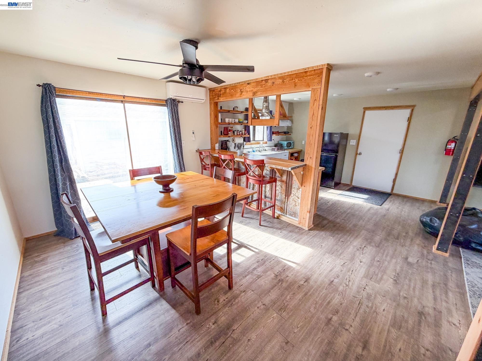 609 East 7th Street Alturas, CA 96101 - Photo 18 of 21 a view of a dining room with furniture and a window