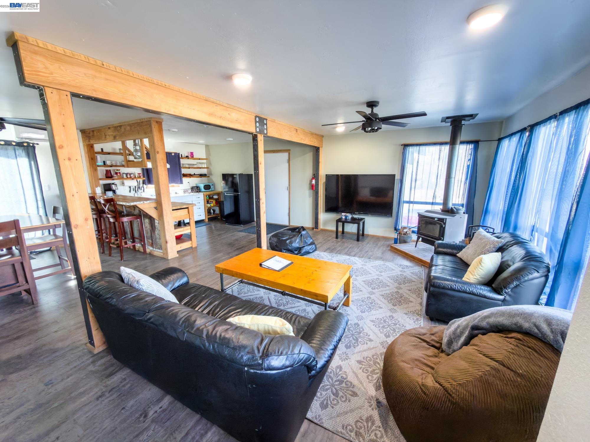 609 East 7th Street Alturas, CA 96101 - Photo 4 of 21 a living room with furniture and a fireplace