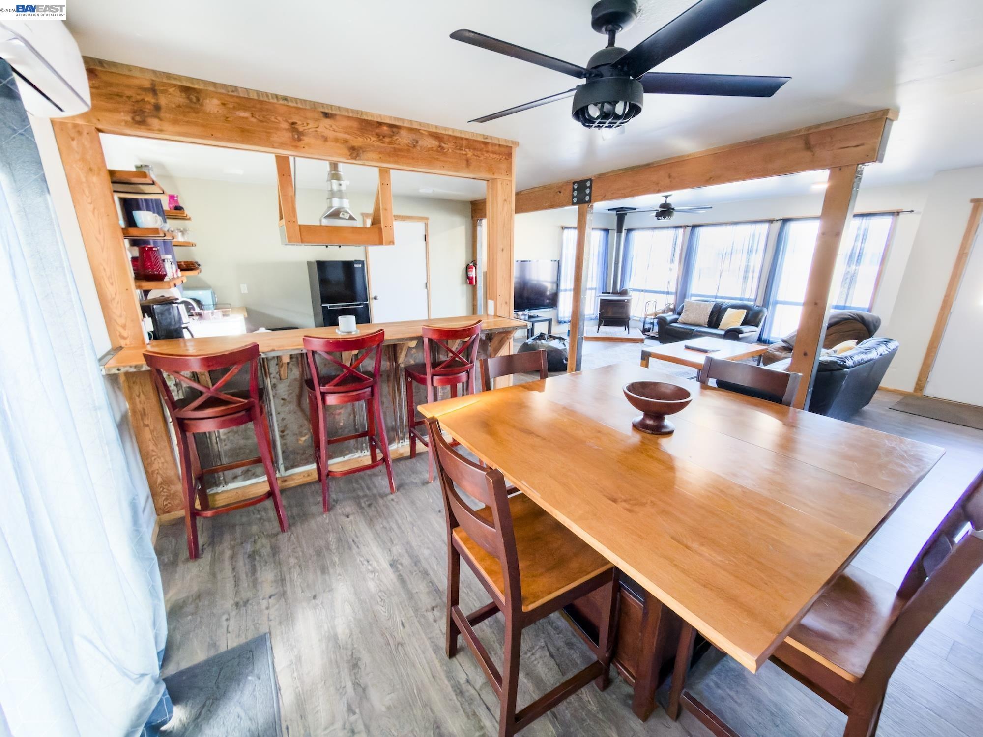 609 East 7th Street Alturas, CA 96101 - Photo 5 of 21 a view of a dining room with furniture window and wooden floor