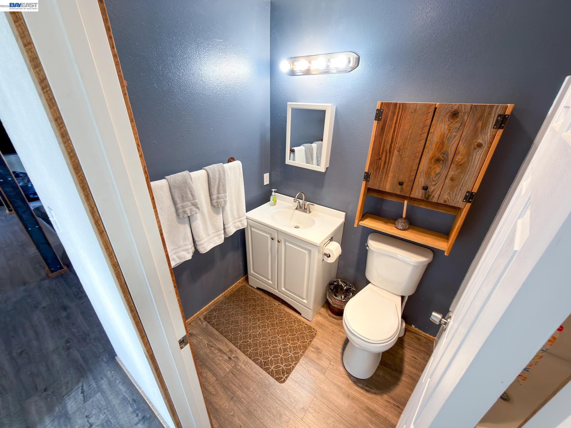 609 East 7th Street Alturas, CA 96101 - Photo 9 of 21 a bathroom with a sink and a toilet