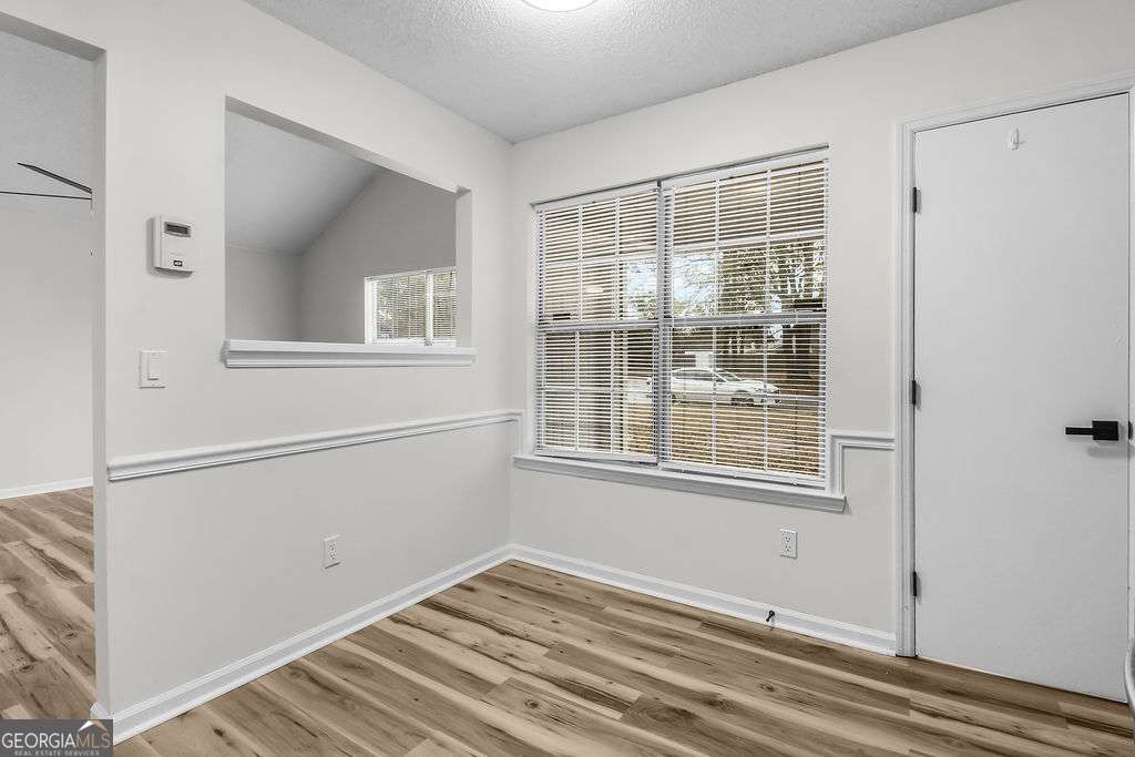 804 Ridgewood Way Hinesville, GA 31313 - Photo 9 of 27 a view of an empty room with a window