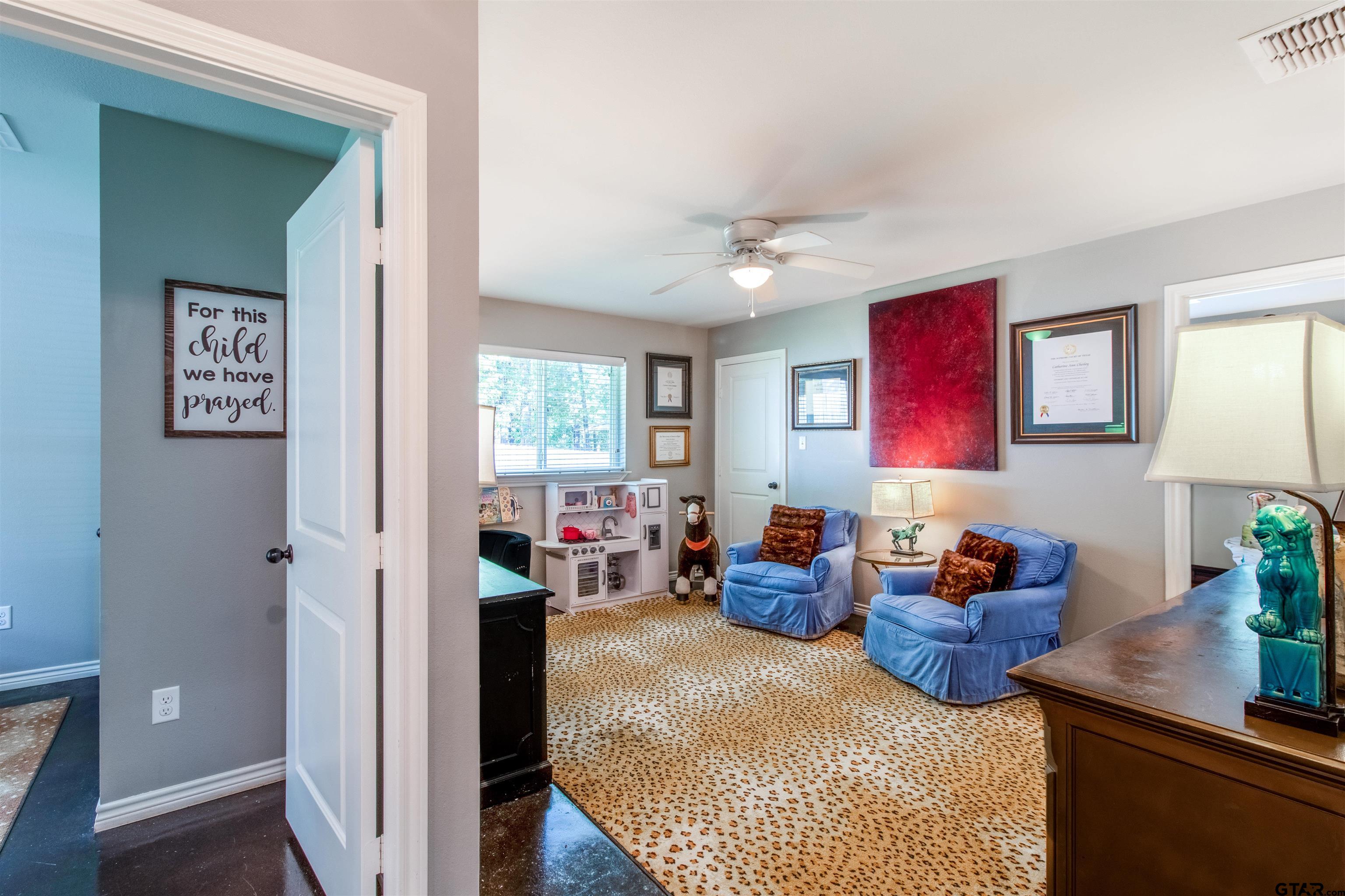 14271 NW Road Tyler, TX 75707 - Photo 18 of 48 a living room with furniture a rug and a window