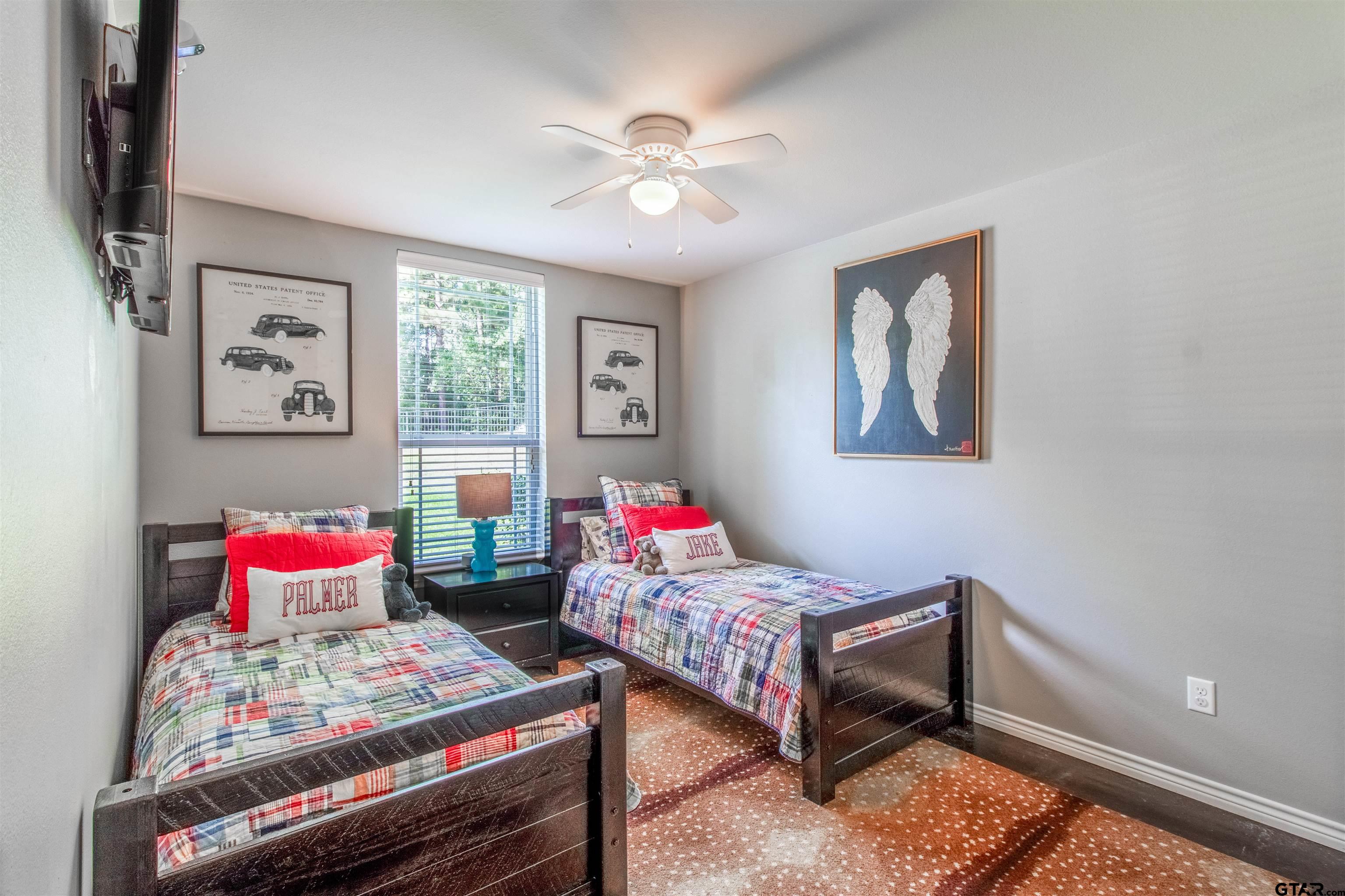 14271 NW Road Tyler, TX 75707 - Photo 2 of 48 a living room with furniture and a baby crib