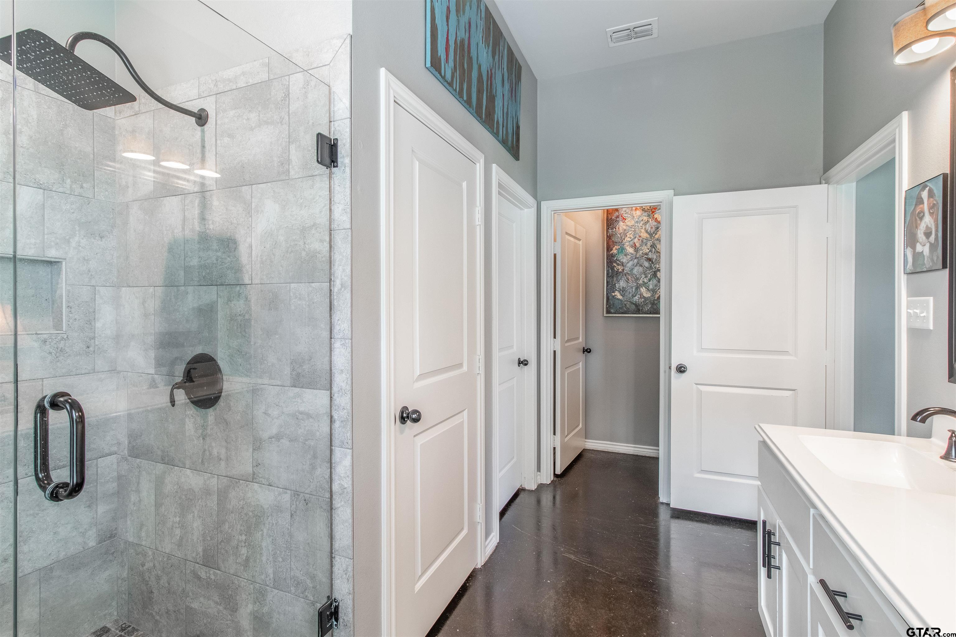 14271 NW Road Tyler, TX 75707 - Photo 27 of 48 a bathroom with a sink and shower