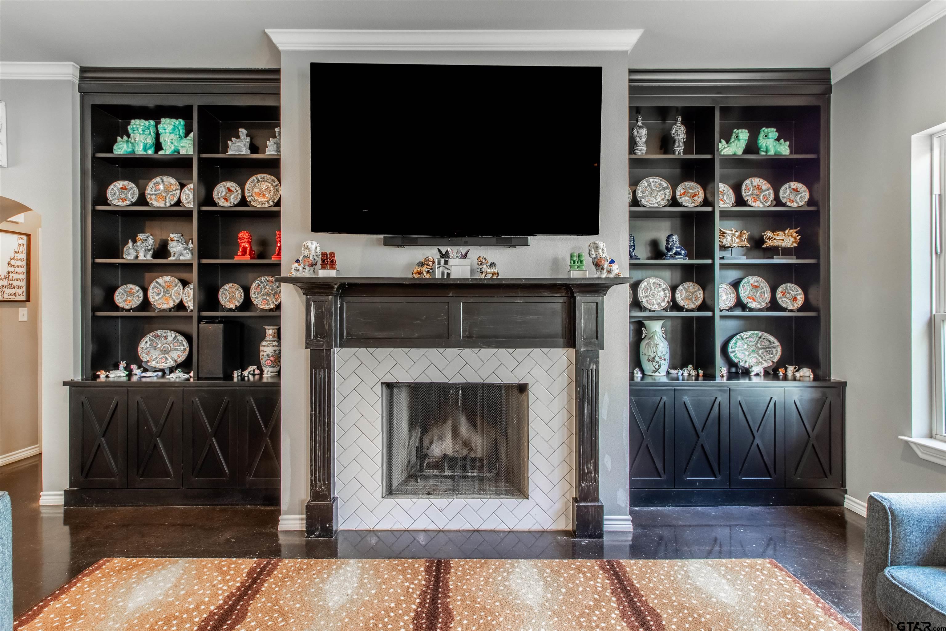 14271 NW Road Tyler, TX 75707 - Photo 46 of 48 a living room with a flat screen tv and a fireplace