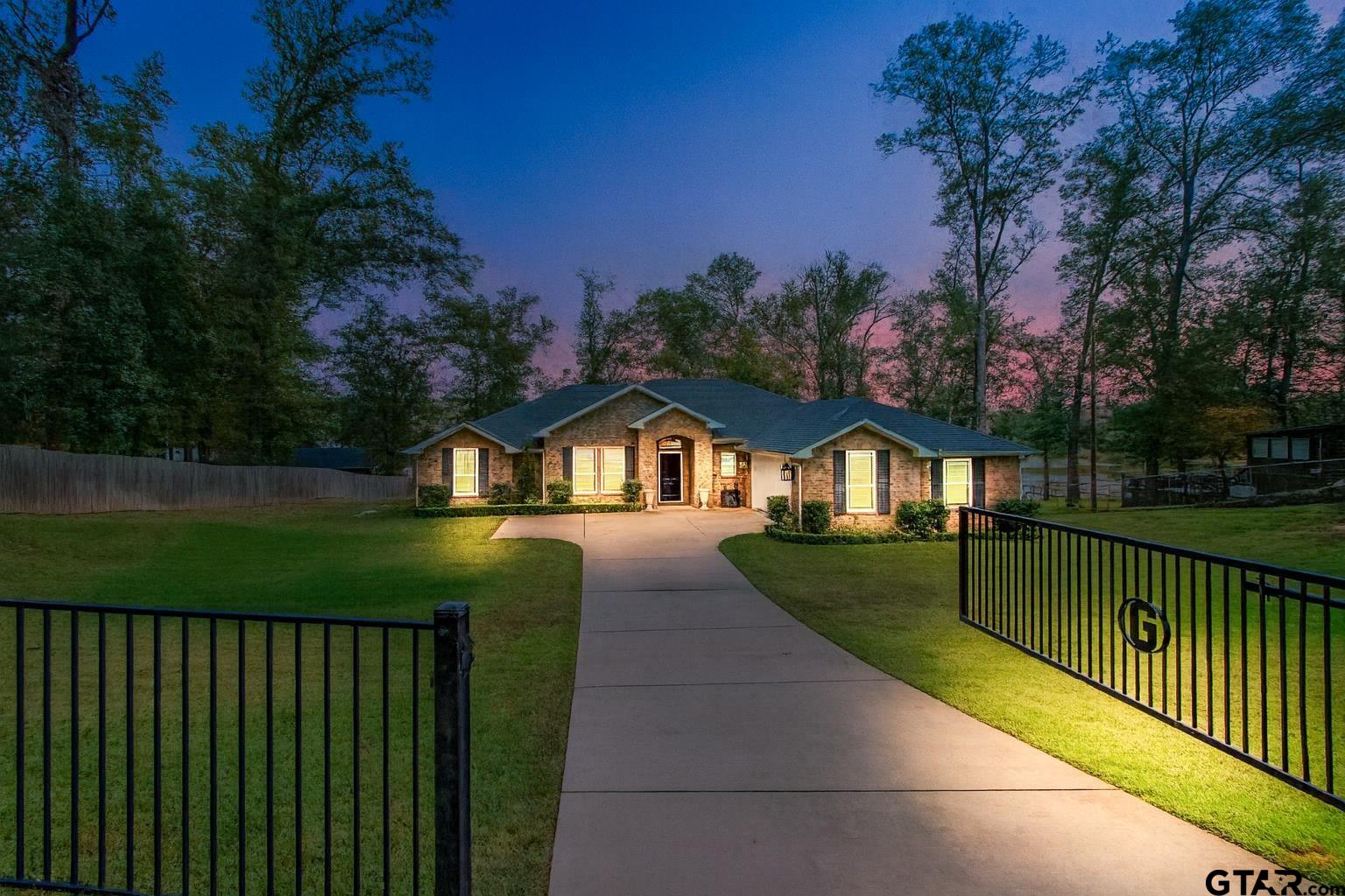 14271 NW Road Tyler, TX 75707 - Photo 48 of 48 a front view of a house with a yard