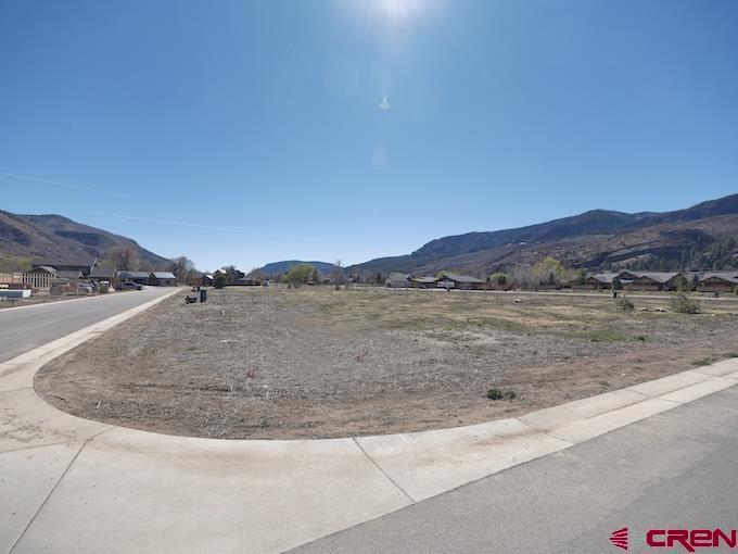 14 Elkview Court Durango, CO 81301 - Photo 5 of 9 a view of a dry yard with mountain and trees