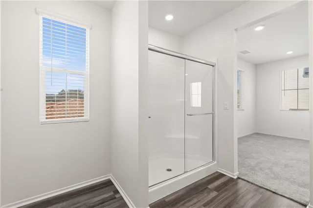 a view of an empty walk in closet