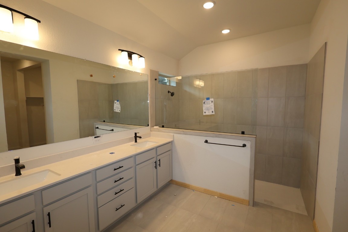 42623 Rustico Road Magnolia, TX 77354 - Photo 11 of 17 a spacious bathroom with a double vanity sink mirror and double