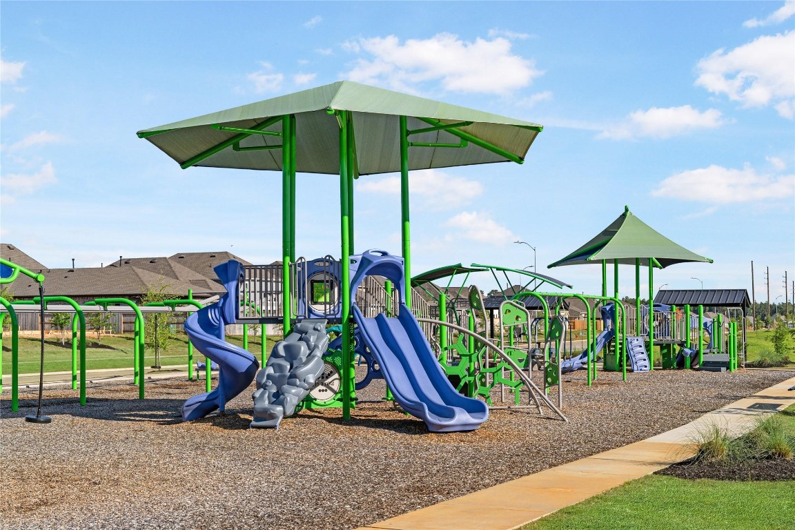42623 Rustico Road Magnolia, TX 77354 - Photo 16 of 17 a view of outdoor space with playground and green space