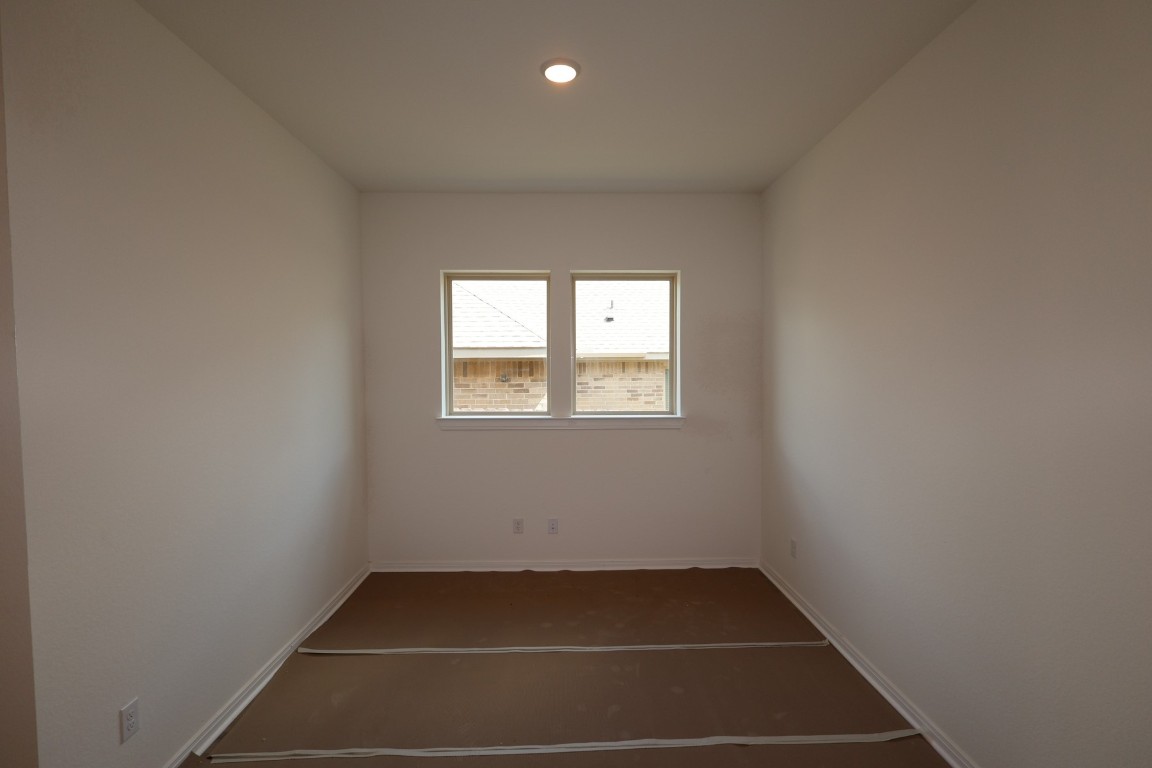 42623 Rustico Road Magnolia, TX 77354 - Photo 7 of 17 a view of a room with rack on the wall and a window