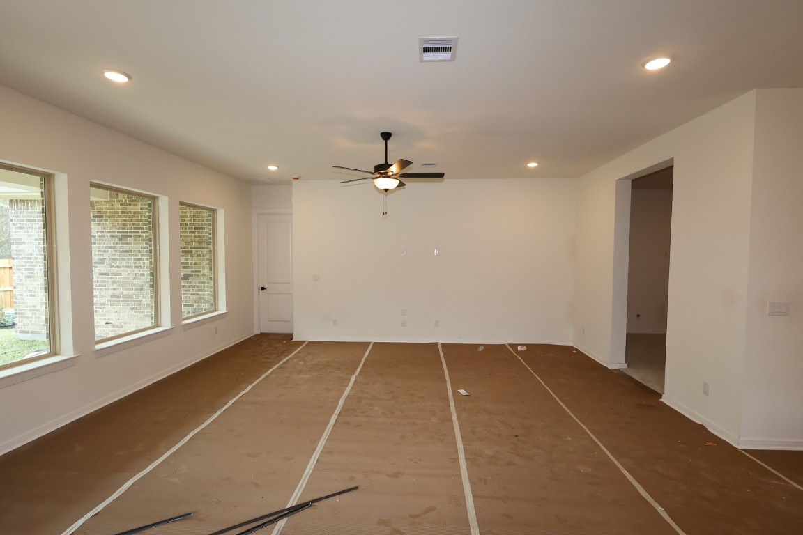 42623 Rustico Road Magnolia, TX 77354 - Photo 9 of 17 a view of an empty room with a window