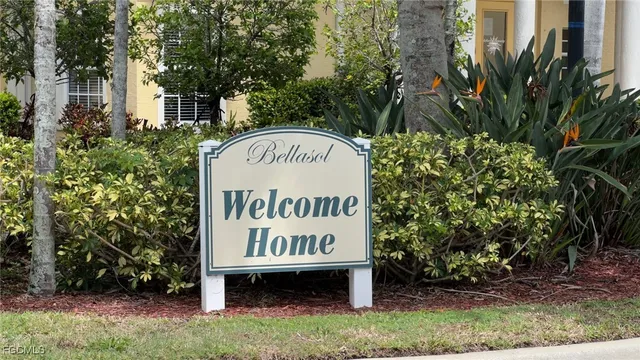 a sign on the side of the road