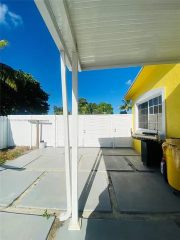 a view of a room with windows