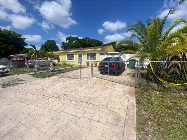 a view of a house with a patio