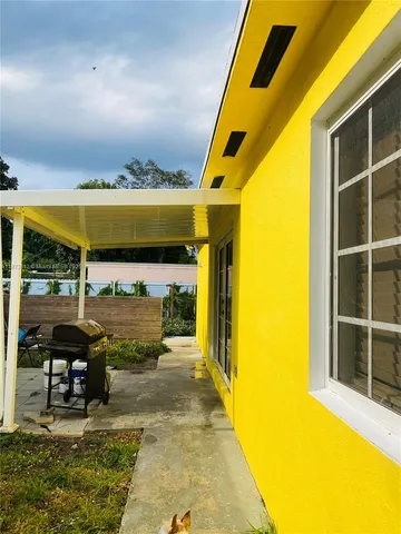 a kitchen with a stove and a microwave
