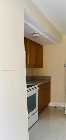 a view of a pathway along the building