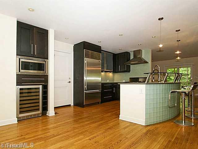 4102 Rockingham Road South Greensboro, NC 27407 - Photo 4 of 16 Kitchen. Gourmet kitchen w/SS high-end appliances you won t find in many other homes.