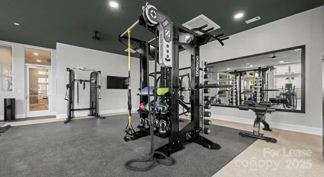 a view of a room with gym equipment