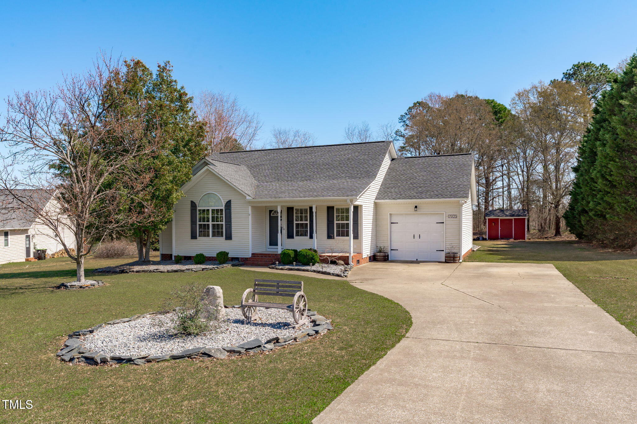 a view of a house with swimming pool and sitting area