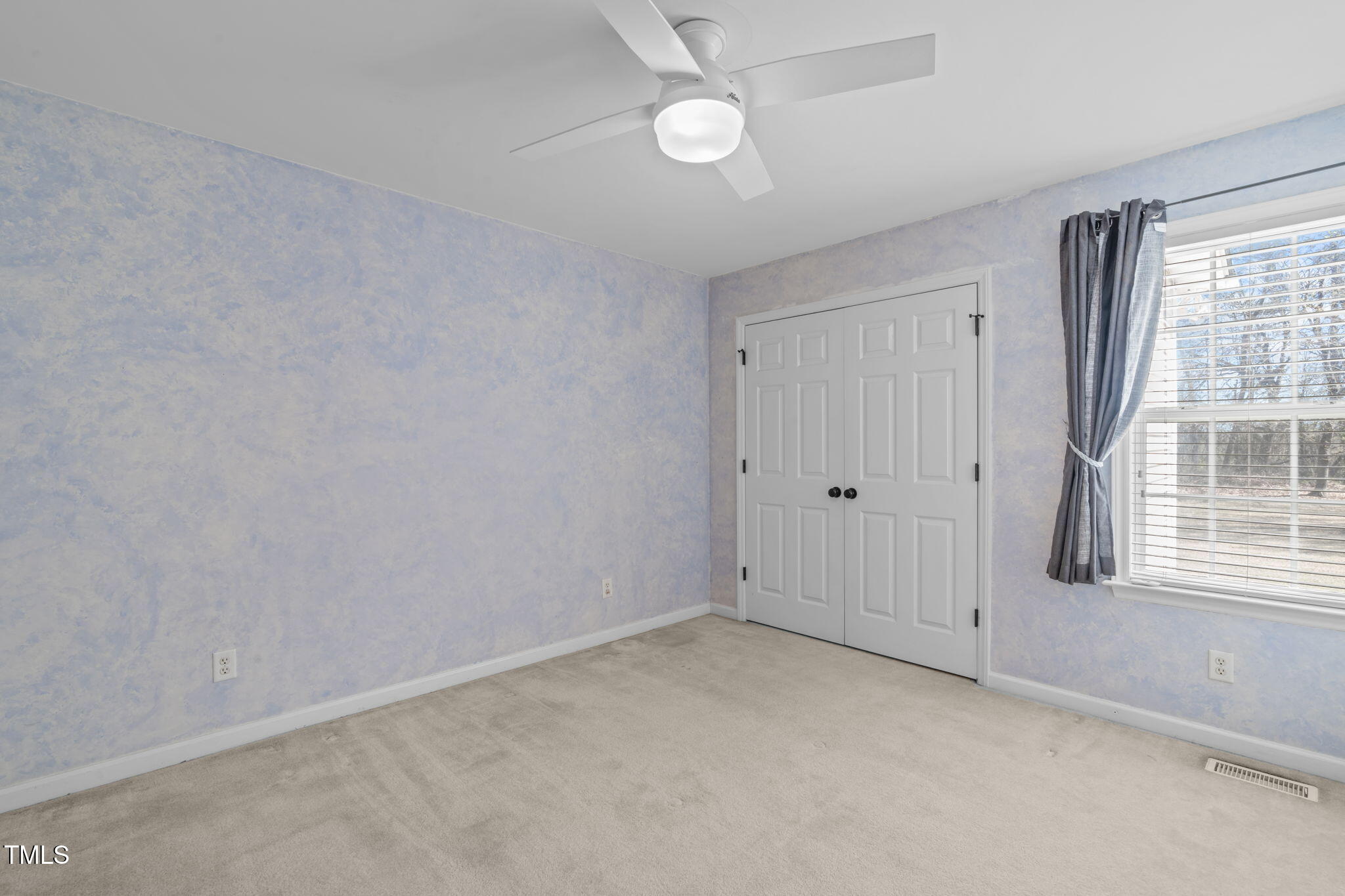 7905 Willow Croft Drive Willow Spring, NC 27592 - Photo 13 of 26 a view of an empty room with a window