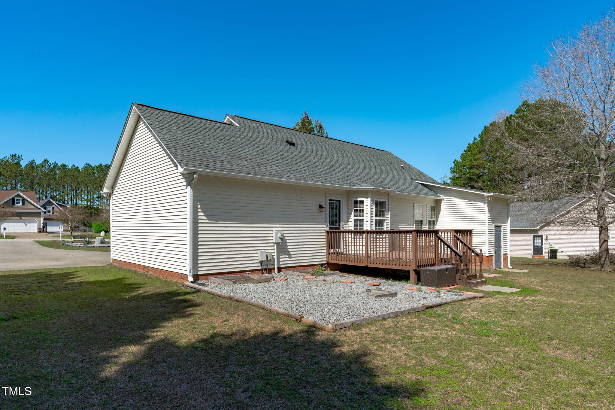 7905 Willow Croft Drive Willow Spring, NC 27592 - Photo 21 of 26 a view of a house with a yard