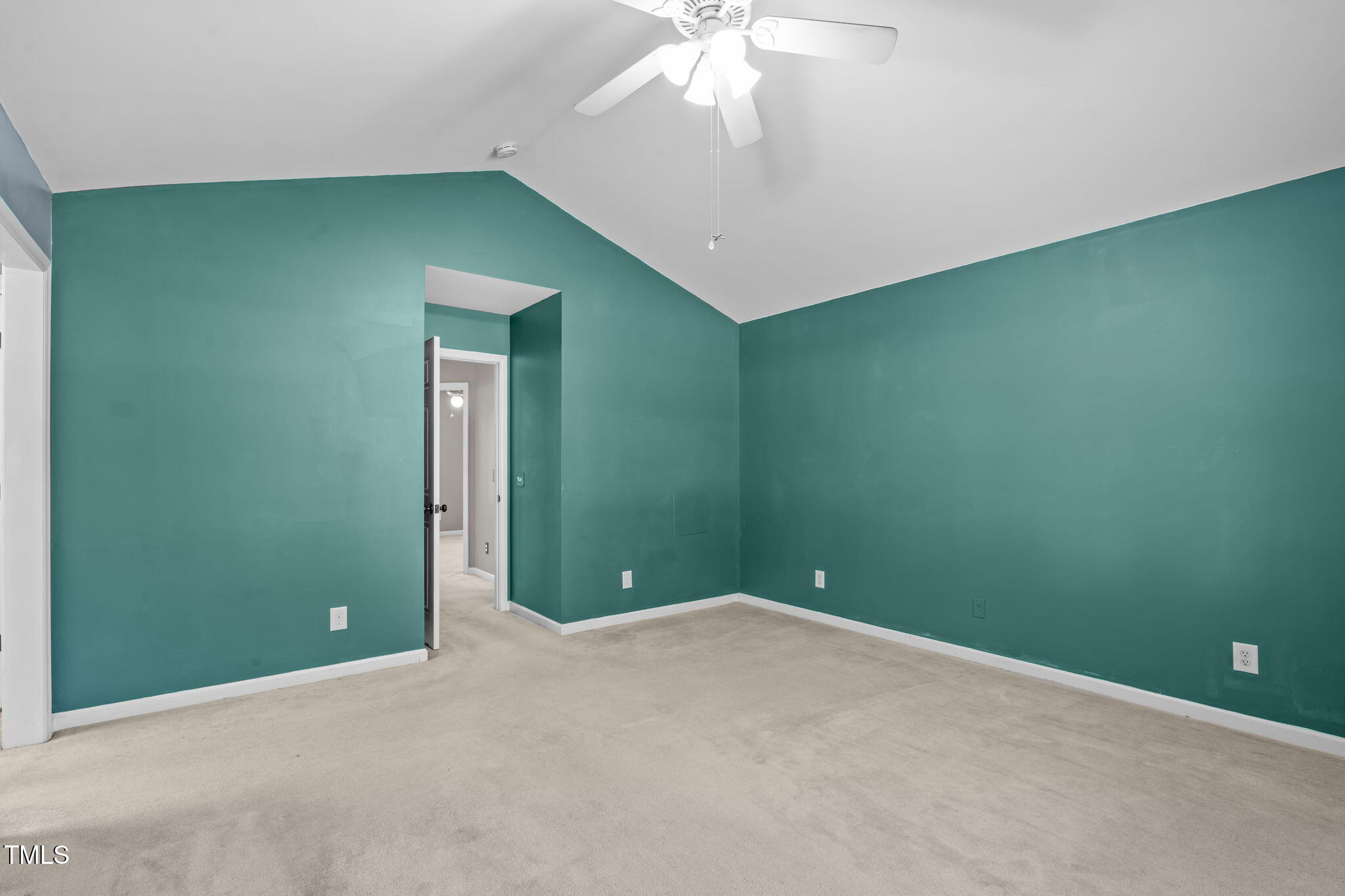 7905 Willow Croft Drive Willow Spring, NC 27592 - Photo 9 of 26 an empty room with a fan & a fan