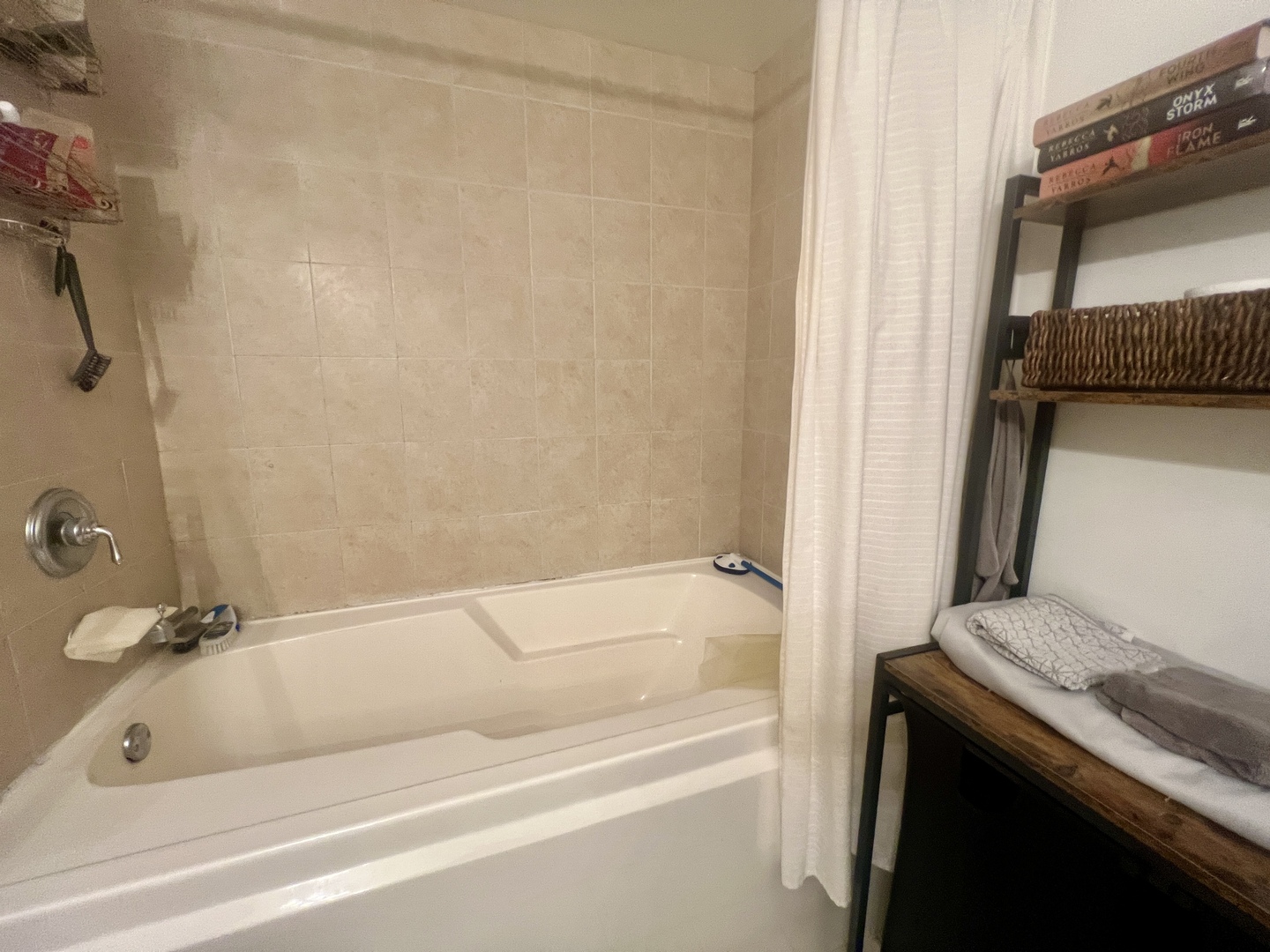 1151 West 15th Street, Unit 137 Chicago, IL 60608 - Photo 15 of 27 a bathroom with a tub and a shower