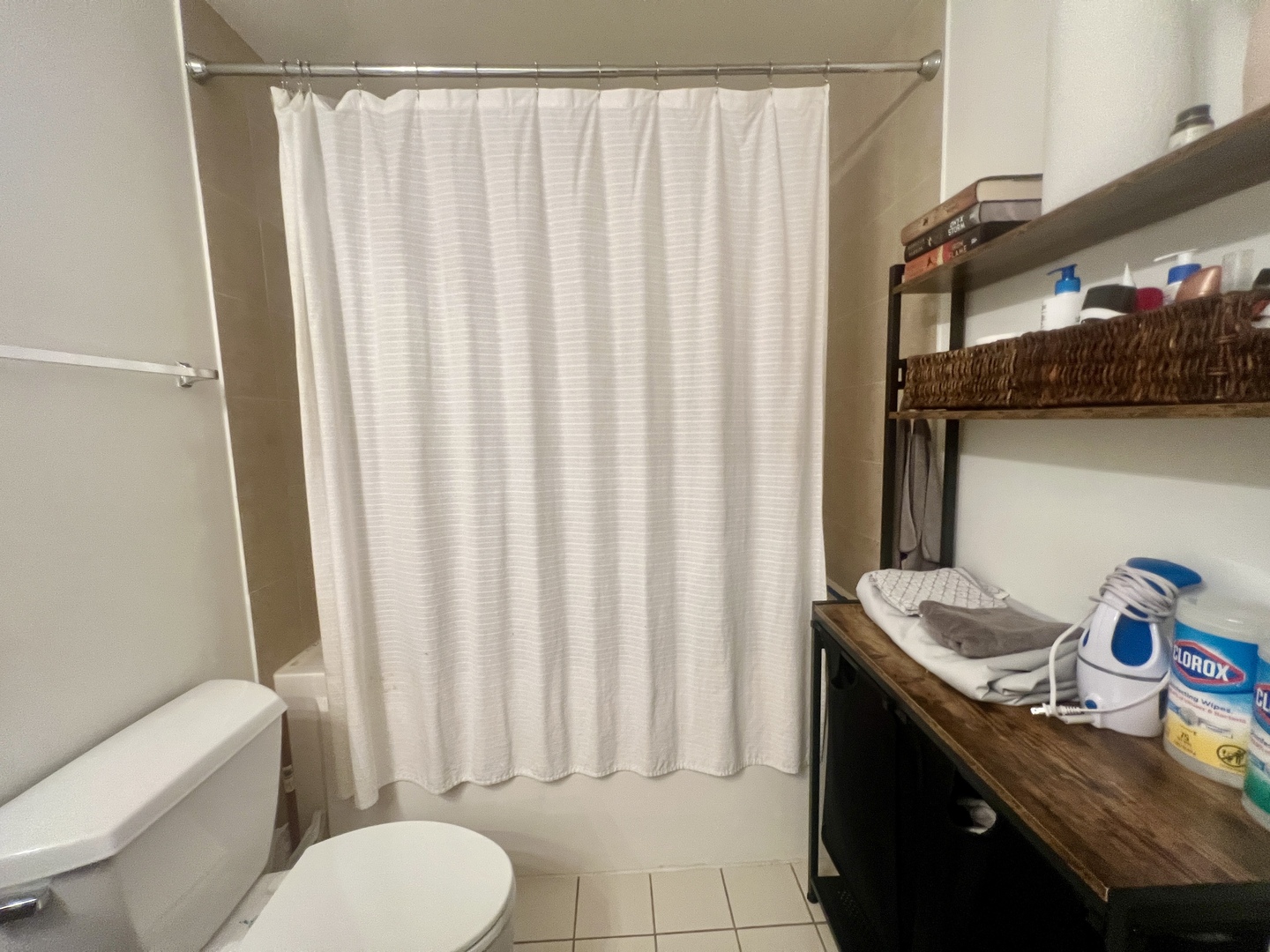 1151 West 15th Street, Unit 137 Chicago, IL 60608 - Photo 16 of 27 a bathroom with a granite countertop sink and a toilet