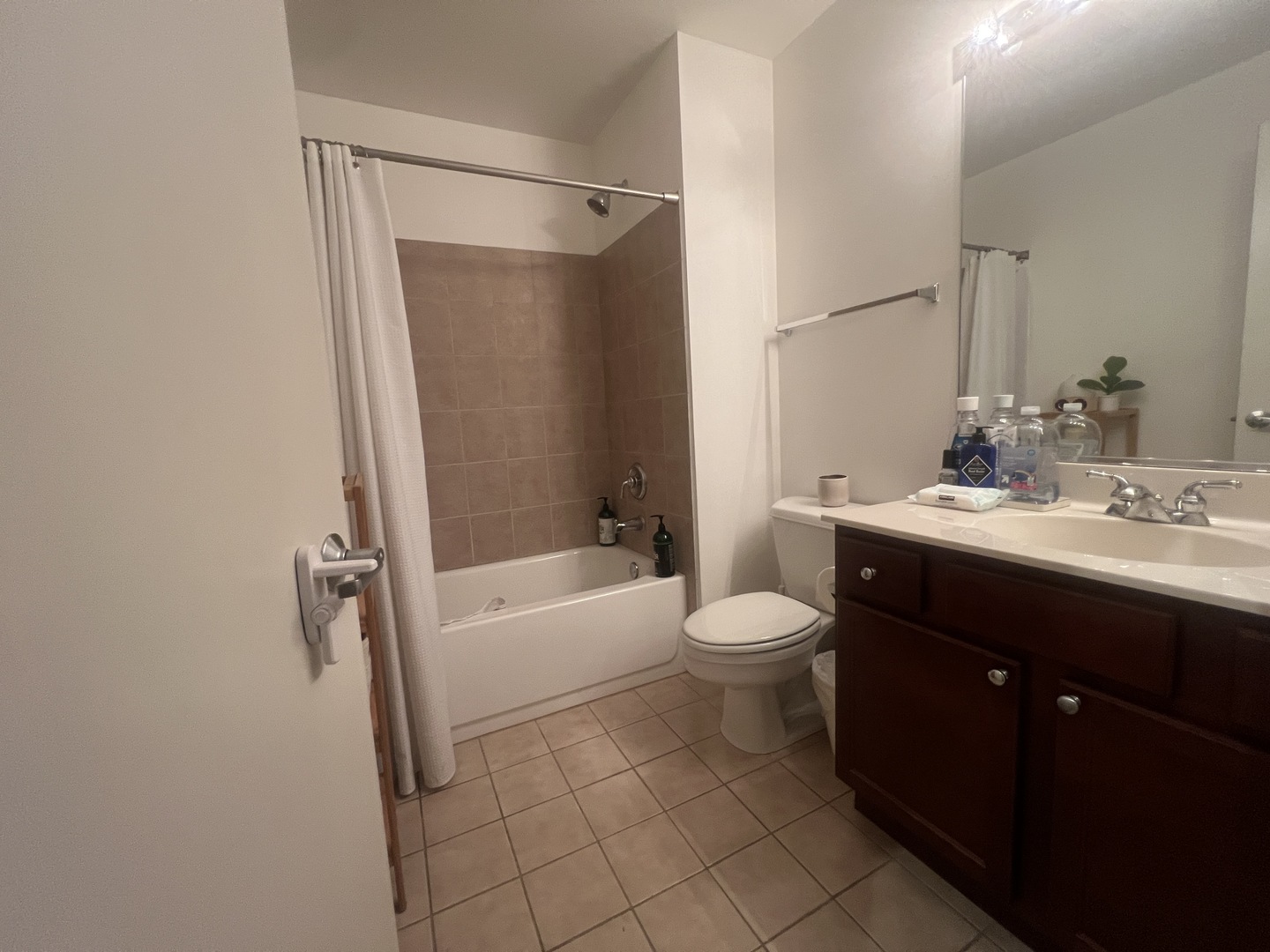 1151 West 15th Street, Unit 137 Chicago, IL 60608 - Photo 20 of 27 a bathroom with a sink a toilet and shower