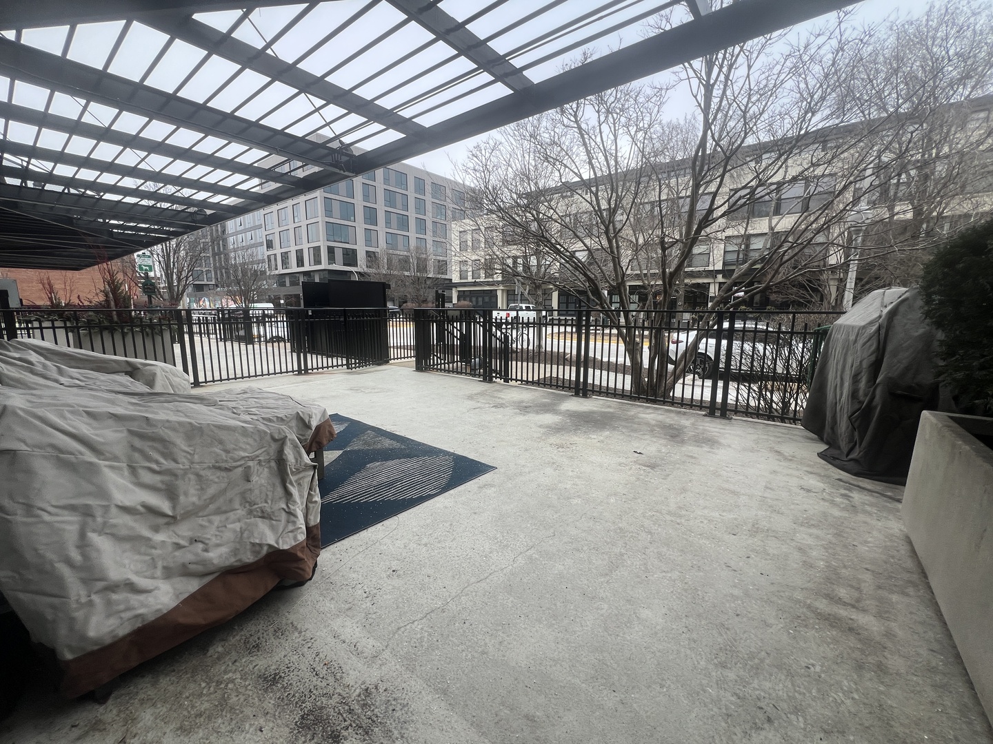 1151 West 15th Street, Unit 137 Chicago, IL 60608 - Photo 21 of 27 a view of a backyard with a couch
