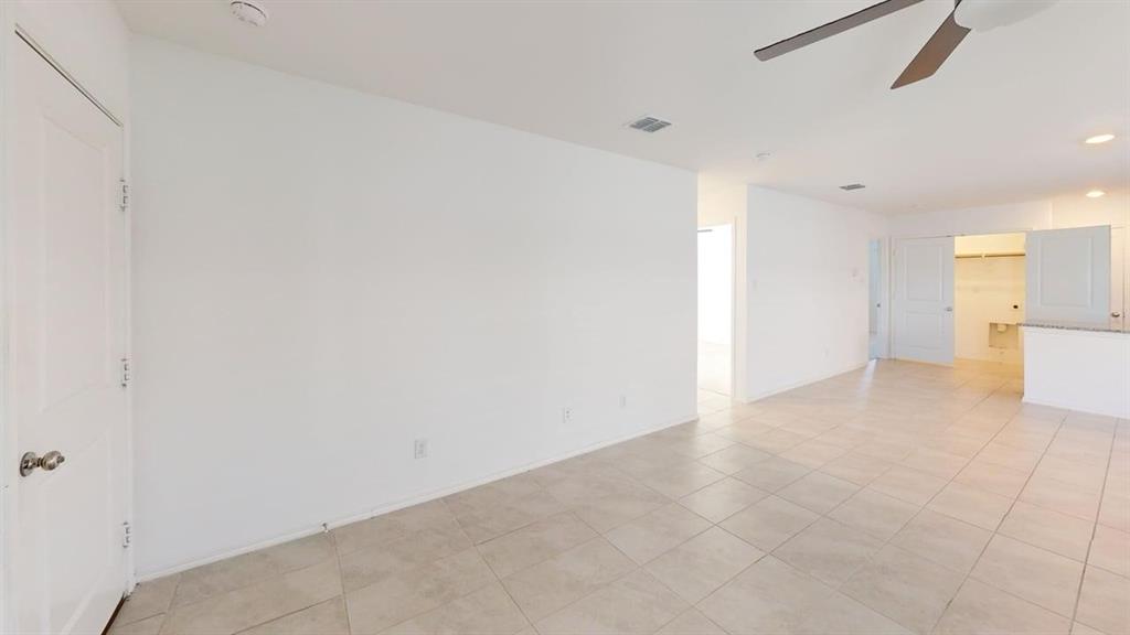 5970 Wedgemere Drive Princeton, TX 75407 - Photo 2 of 17 a view of a big room with closet and windows